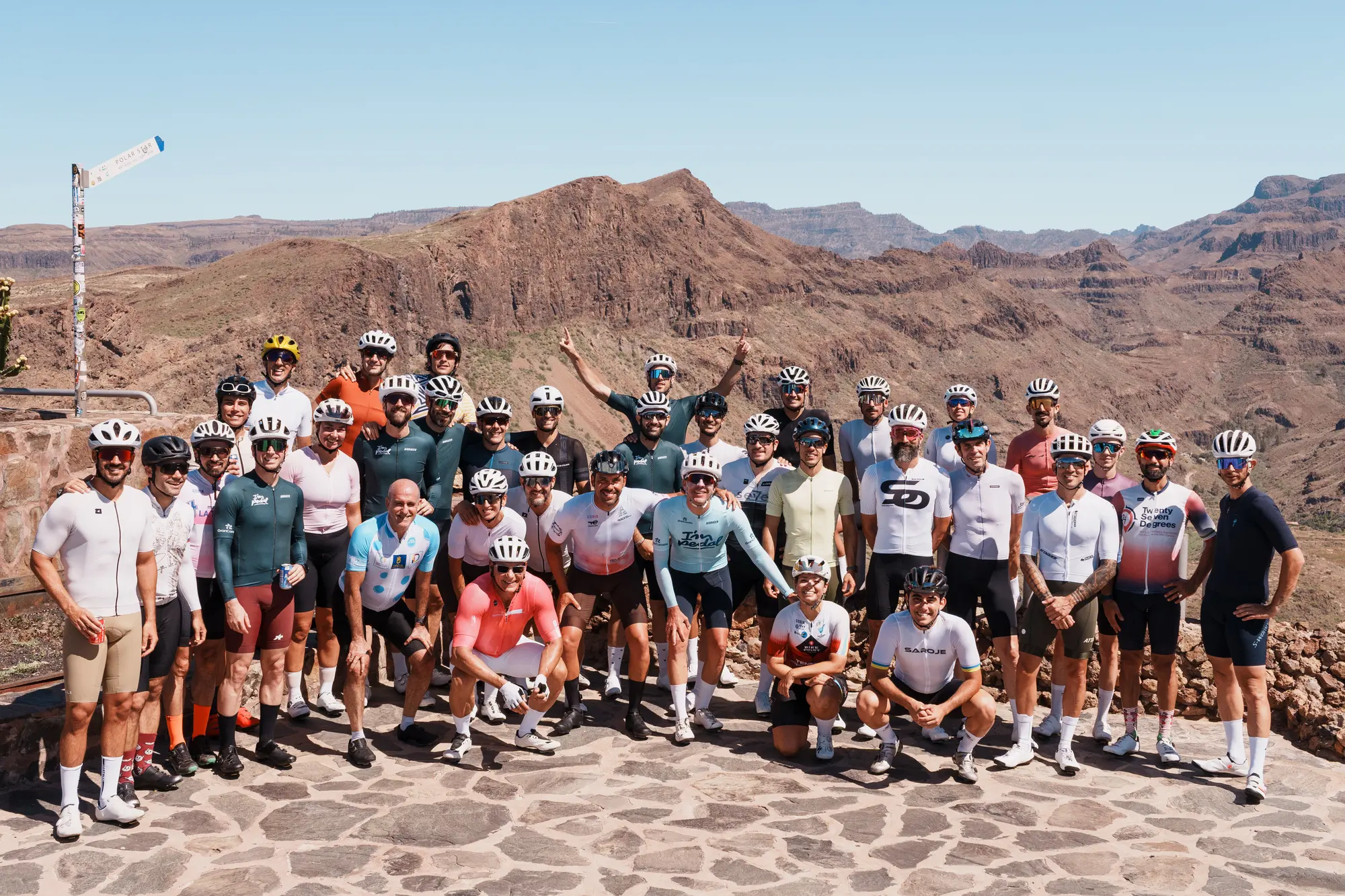 A large I'M PEDAL group at a mountain viewpoint in Gran Canaria